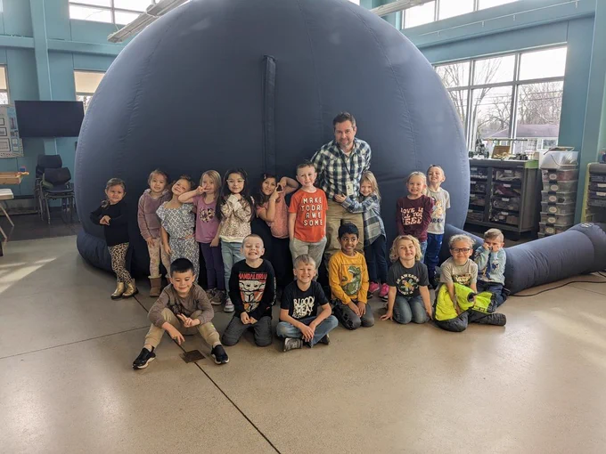 Kindergarteners returning to Earth.