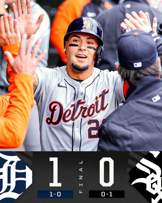 Final: Detroit Tigers 1, Chicago White Sox 0
Pictured: Javier Báez high-fives his teammates in the Tigers dugout. He is wearing a gray Tigers jersey with navy blue and orange lettering.