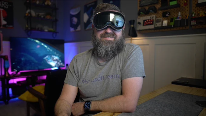John Moore wearing his Apple Vision Pro headset and his Microsoft Teams t-shirt.
