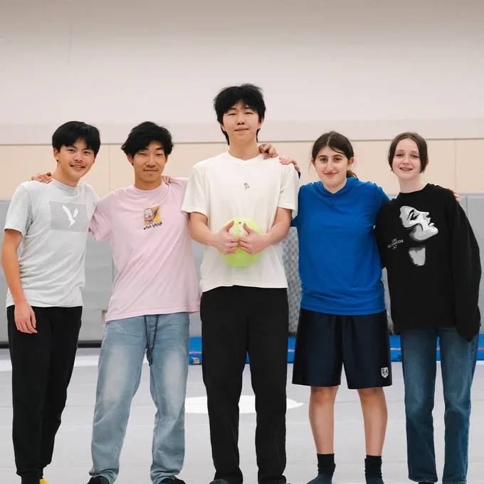 A group of youth pose for a photo