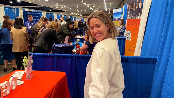 An OGS team member smiles for the camera in between connecting with job seekers during the Dr. King Career Fair at the Empire State Plaza in Albany, NY.