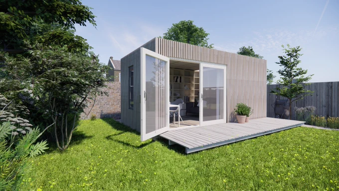 A rectangular garden building on a sunny day. The double doors are open and one can see office furniture inside.