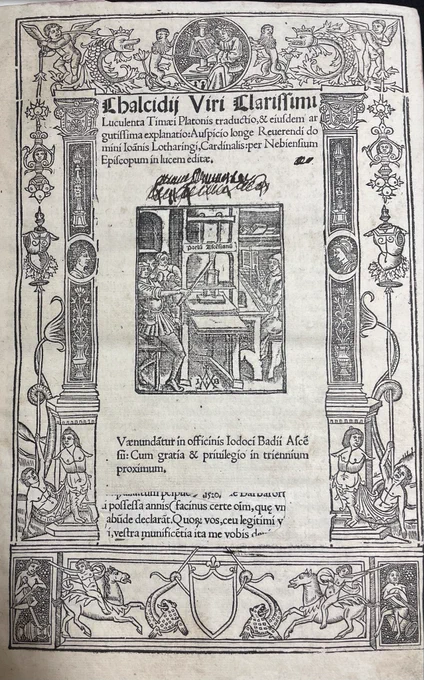 Distinctive decorative title page from the printing press of Josse Badius - depicting a working printer’s workshop. The press is labelled ‘Prelum Ascensianum’ the name of the workshop in Paris