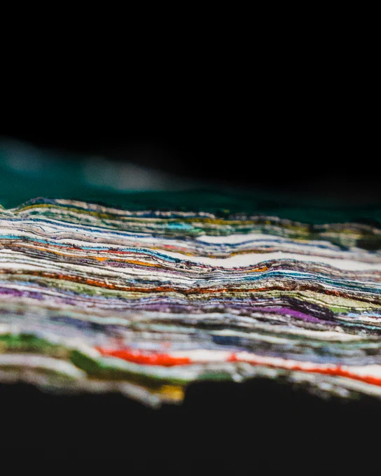 A closeup of colorful paint layers from the Rock