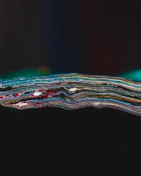 A closeup of colorful paint layers from the Rock