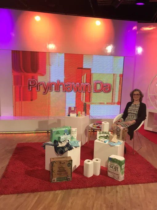 In a TV studio ready for live TV an hour later, in a dress and lots and lots of shopping on display from my unloaded panniers. All examples of recycled, unbleached and washable personal hygiene products. Essential stuff, but not in the least bit glamorous lol.