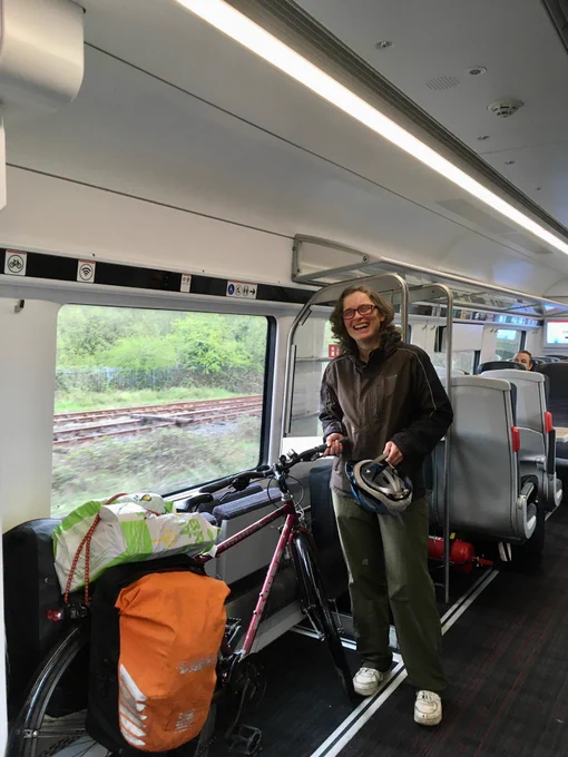 I’m on a train with bicycle and fully laden panniers, wearing distinclty unglamorous waterproof clothing - second hand of course.