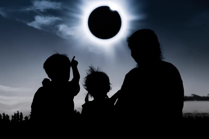 The timeless silhouette, shadow and light contrasts of a solar eclipse.