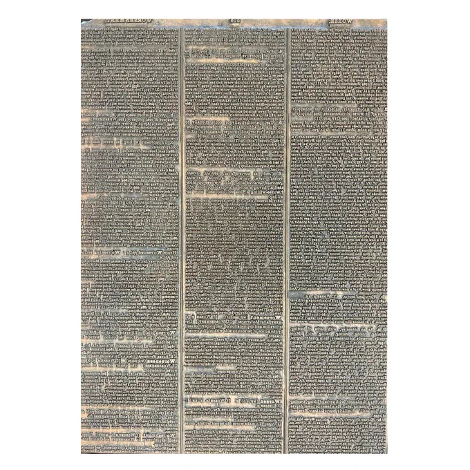 OED printing plate for vol. 12, sig. 62, p. 318. Steel and antimony. Ca. 1928. Ex coll. Karolyne & Bryan A. Garner.  Steel and antimony printing plate in three dense columns of text for OED printing. 