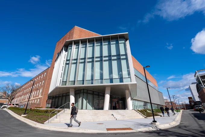 Chemistry Building exterior with person walking by