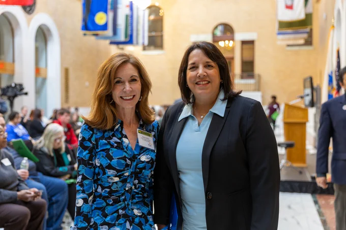 LG Driscoll and woman pose for photo. 