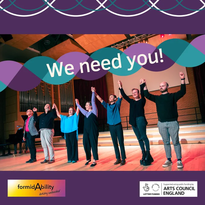 This is a photo of the Song in Sign performance team holding hands for an end-of-performance bow in a wooden floored concert hall. There is a colourful banner graphic which has the text "We need you" over the top of the photo.

In the photo are pianist Nigel Foster, tenor Ben Thapa, soprano Joanne Roughton-Arnold, actor Rhiannon May, actor Petre Dobre,  composer Rylan Clarke and librettist Max Chase.