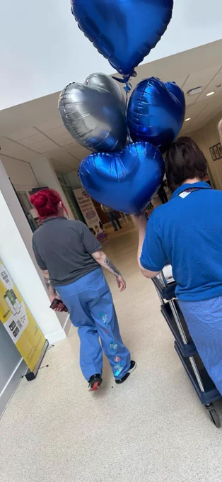 Our discharge Coordinator and our volunteer Colette making their way around the building with quizzes and goodies promoting awareness. Nice trousers you have designed Ashliegh. 