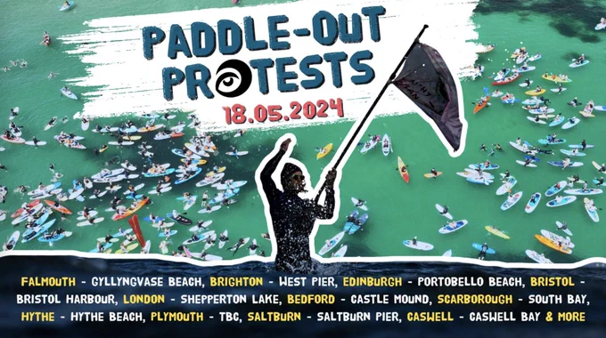 Aerial photograph of a large group of paddleboarders, canoeists and surfers floating on a green-blue sea. The caption reads "Paddle-Out Protests 18.05.2024" and there is a list of key locations including Falmouth, Brighton, Edinburgh, Bristol, London, Bedford, Scarborough, Hythe, Plymouth, Saltburn and Caswell.