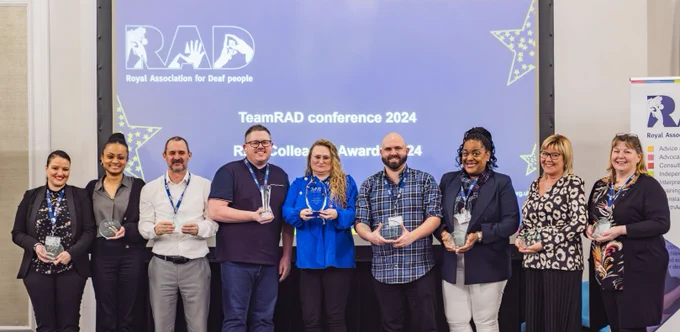 TeamRAD colleague award winners smiling with trophies