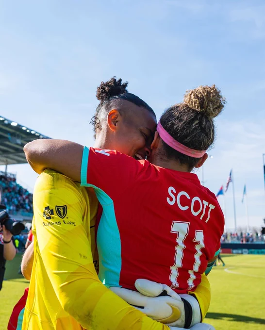 Franch smiling big as she hugs Scott post-match
