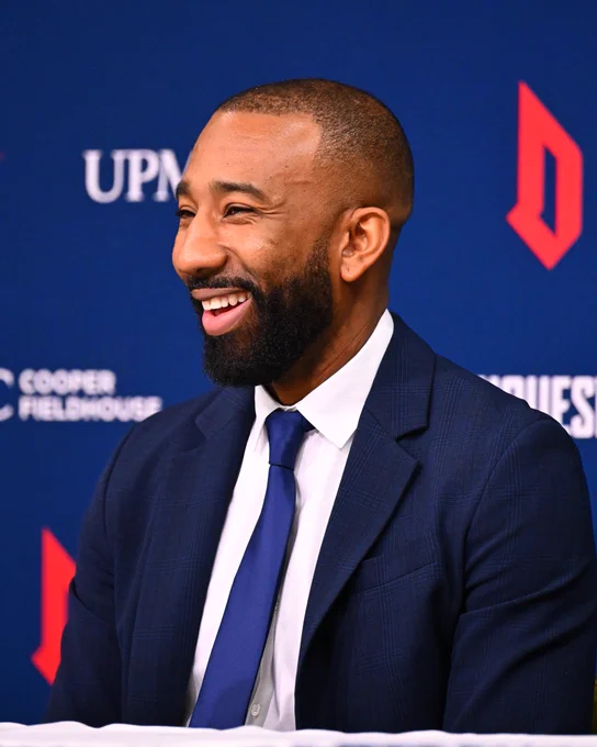 Head Coach Dru Joyce III smiling