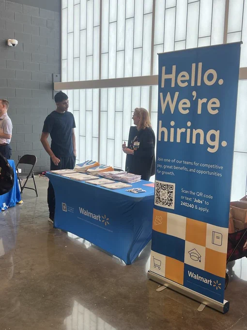 Walmart taking time to talk to a SHS students about a job opportunity.