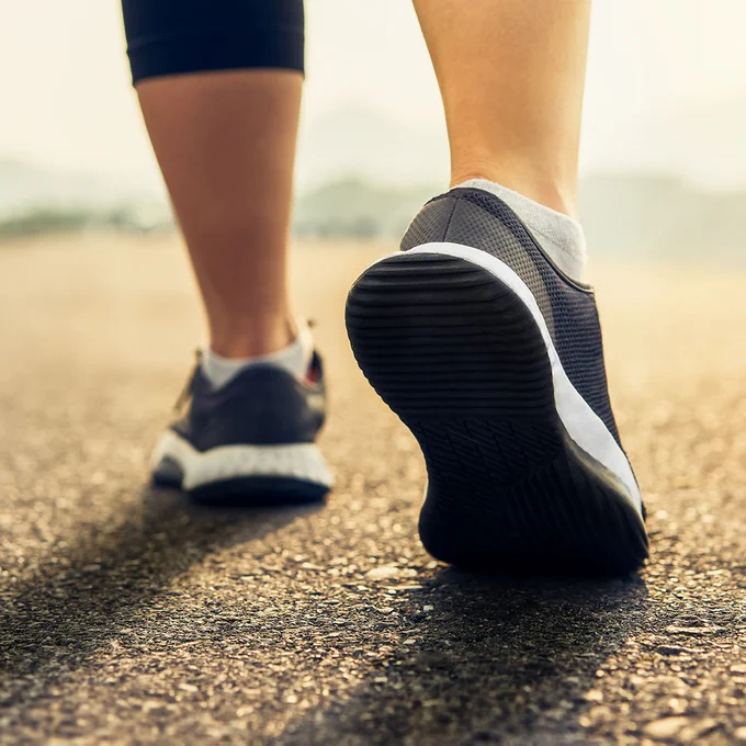Close-up of a runner's feet, poised for beginning a run.