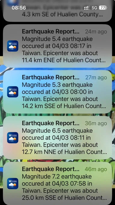 Screenshot of iPhone lock screen showing multiple earthquake report notifications