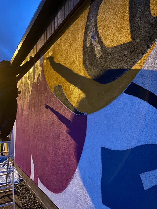 Artists painting the boat house