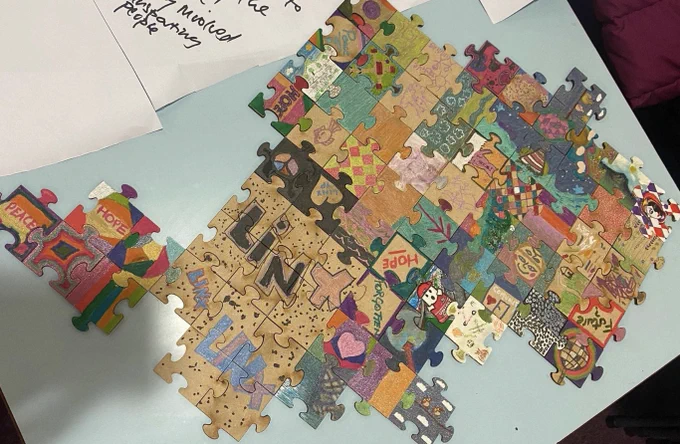 An image of hand drawn puzzle pieces.