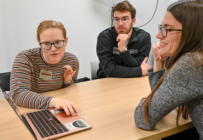 UIndy students work together on a project