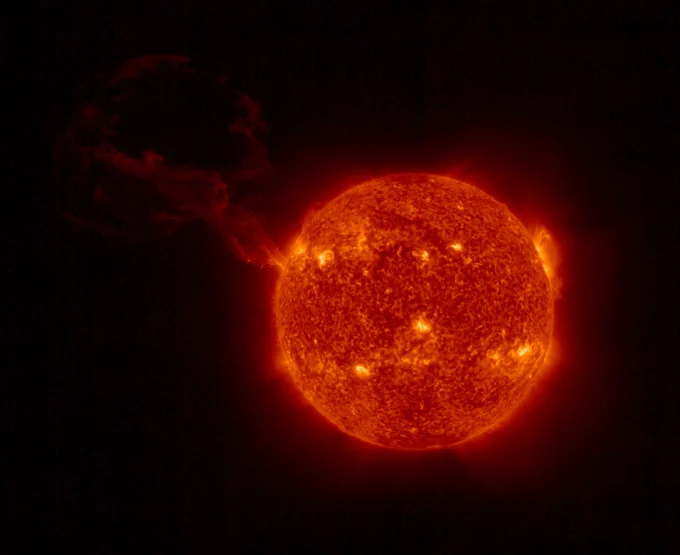 Eruption of material emanating from the Sun