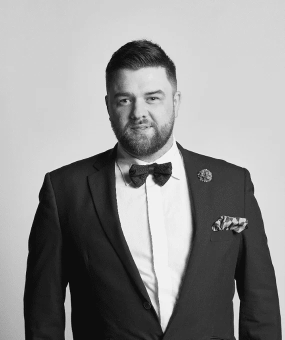 A black and white picture of the events guest speaker, Jamie Shields