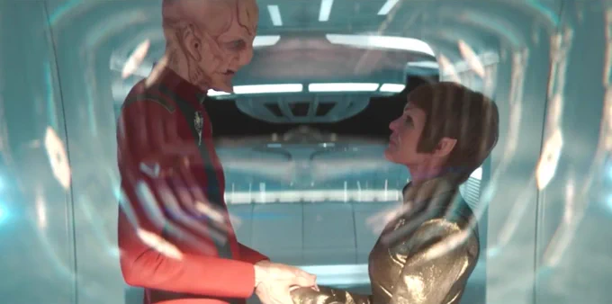 Saru and T’Rina hold hands