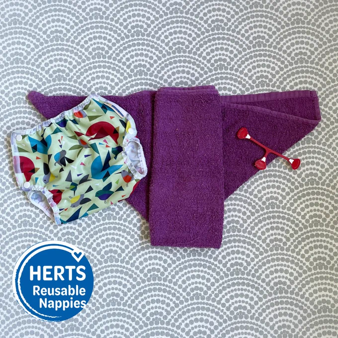 Flat terry square, nappy wrap and nappy fasteners
