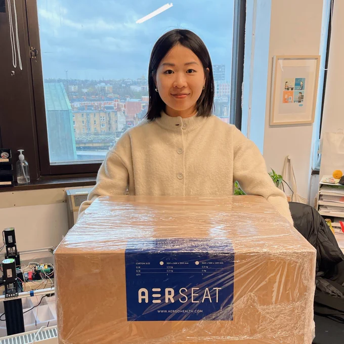 Woman holding a box