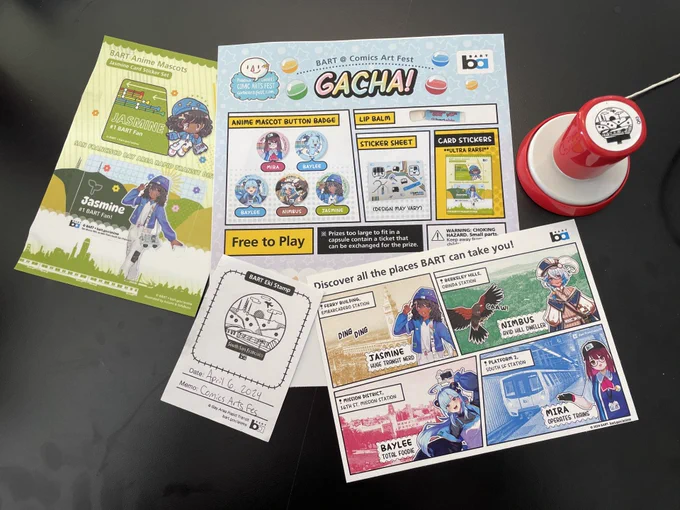 A collection of BART anime mascot hand outs, our Eki Stamp for the event, a Clipper card sticker set for Jasmine. 