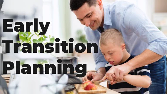 Early Transition Planning- young boy cutting an apple in the kitchen on a cutting board with the help from a caregiver. 