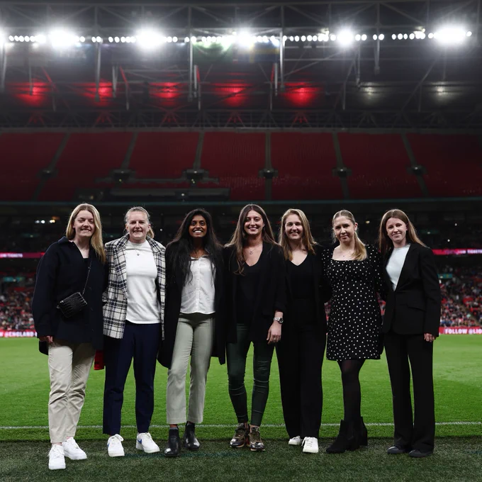Members of the England deaf women's team pose for a photo at Wembley Stadium