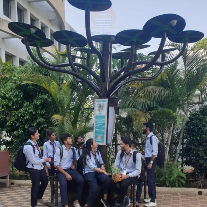 Surshri Smart Solar Tree:

Solar tree generates the electricity with minimum of space while providing an artistic view along with resting places as an additional utility along with comfort.

Customisable Features available in Smart Solar Tree:
CCTV Camera, Decorative LED Lights, Wi-Fi Internet, USB Charging ports, Speaker System with Bluetooth, Display AQI (Music & Entertainment System )

Overall a Self-contained Infotainment can be built up with all these customisable and readily available desired features in smart Solar Tree.

Surshri Smart Solar Tree use cases to Plant :

 *  Industrial areas
 •  Sport stadiums
 •  Residential complexes
 *  Public Places
 *  Halls & Malls
 *  Schools, colleges, University campuses.
 *  Hospitals & hospitality industry.
 •  Entertainment zones
 •  Gardens and Parks
 •  Tourist places 
 *  Smart Cities amenity spaces.

Now a days Smart Towns & even Villages are initiating for Planting of such self sustainable renewable resource energy of Solar TreeS.
