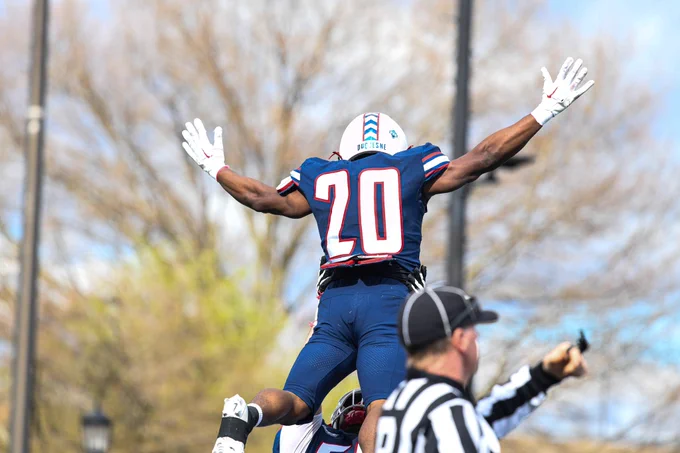Pitts celebrating with hands in air
