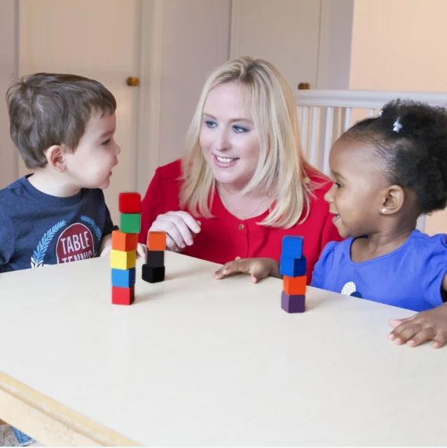 Kim Cunningham OT with two young kids 