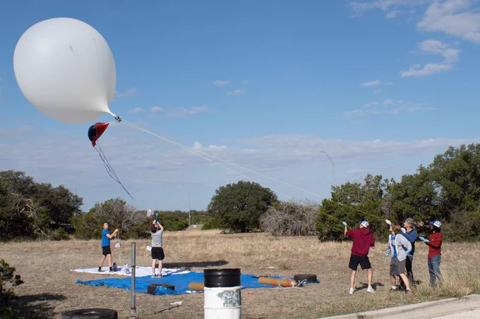 The University of Delaware’s Eclipse Chasers, working to launch a research balloon in Texas, during the October eclipse.