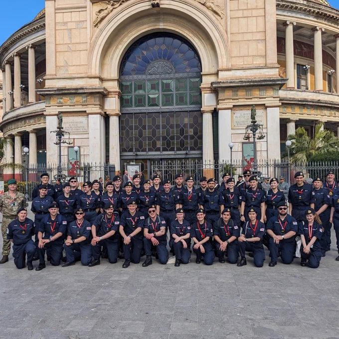 Group of Officer Cadets outside a building in Sicily