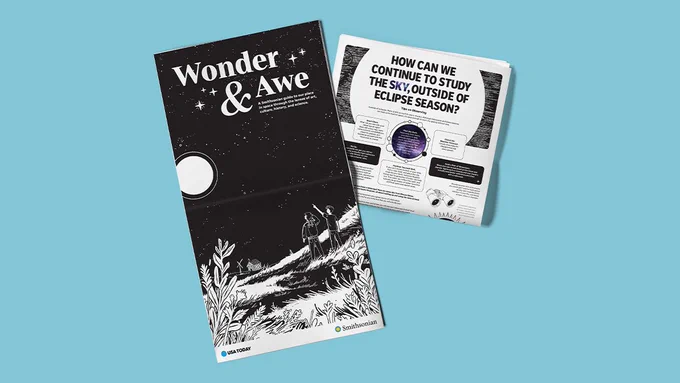On a light blue background, a newspaper is shown on the left and closed on the right. On the left, the newspaper is titled “Wonder & Awe” and it shows two people looking up at the moon and stars. On the right, the paper has the headline “How can we continue to study the sky, outside of eclipse season?”