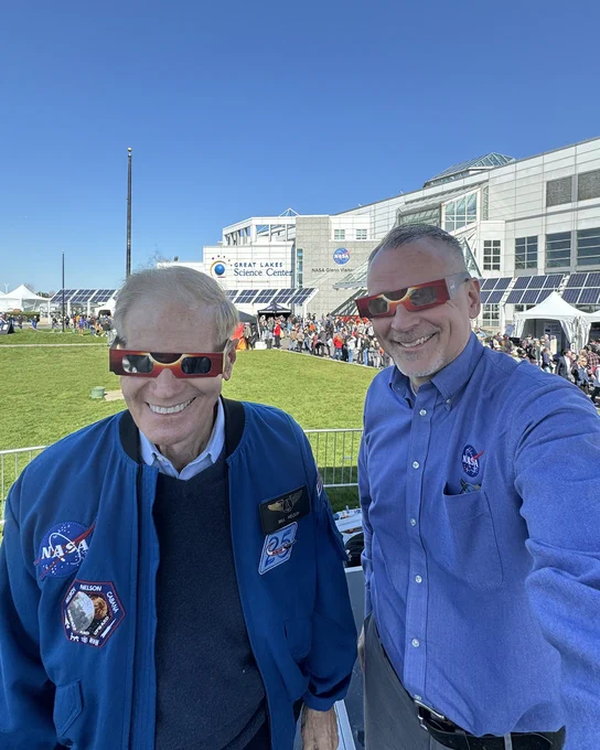 A selfie photo of Administrator Bill Nelson and Associate Administrator Jim Free wearing eclipse glasses.