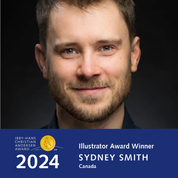 Photograph of Sydney Smith with the text: IBBY Hans Christian Andersen Award 2024 Illustrator Award Winner.