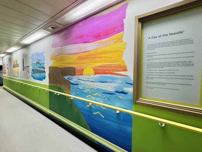 A long section of wall showing an abstract collage of the seaside