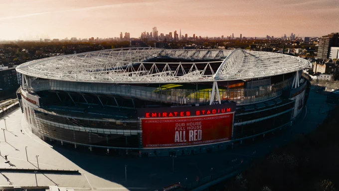 Emirates Stadium. Our house. Full house. All red.