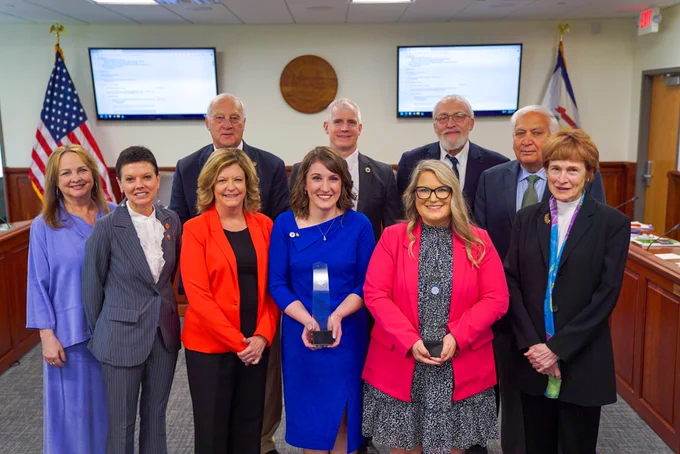 Pictured are Milken Educator Award Vice President Stephanie Bishop, and 2023 West Virginia Milken Educators Ashley Wilkins and Janna Hamrick posing for a group photo with members of the West Virginia Board of Education.