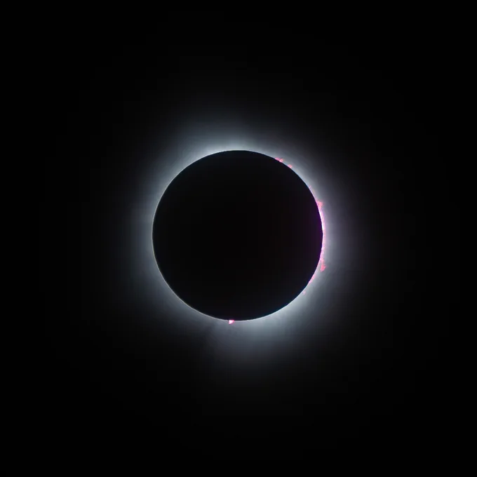 A total solar eclipse, with just the corona of the Sun visible around the outside