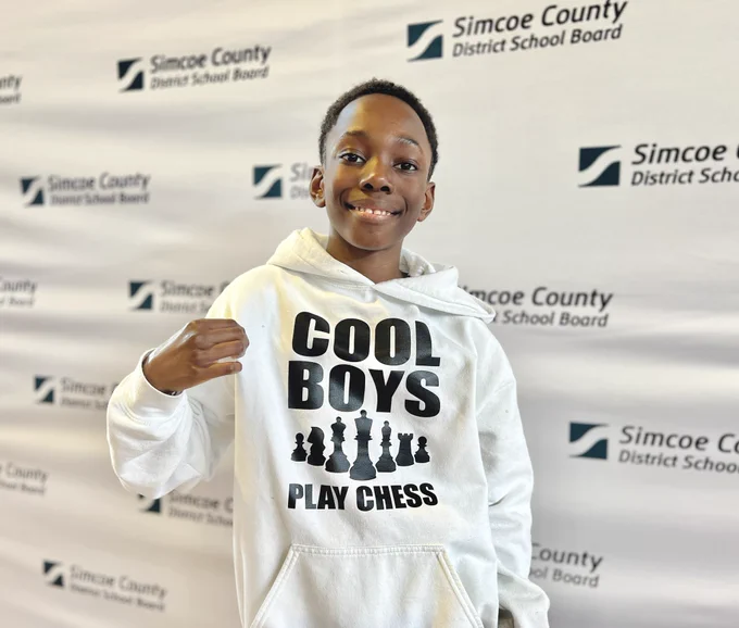 Student smiling into camera