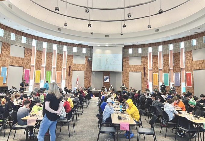 Large group of students playing chess