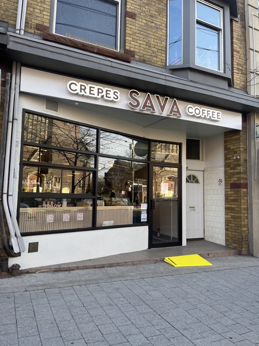 A yellow StopGap ramp outside of Sava Crepes